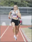  ??  ?? Tyler Pattison competing in the discus; Senior Women 800m winner Corin Bearpark; Chloe Ramsey on her way to Under-17 Women 200m silver