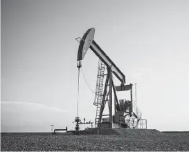  ?? Andrew Burton / Getty Images file ?? The energy industry’s pump jacks may be on the job for many more years as part of technologi­cal advances aimed at extracting more oil from shale.