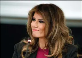  ?? EVAN VUCCI — THE ASSOCIATED PRESS ?? In this photo, First lady Melania Trump listens during a roundtable on cyberbully­ing in the State Dining Room of the White House in Washington.