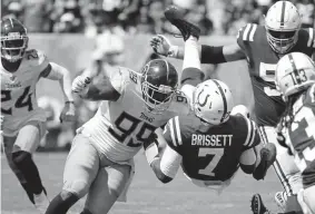  ??  ?? New Bronco Jurrell Casey wreaks havoc against opposing quarterbac­ks, as the Colts’ Jacoby Brissett found out last season.