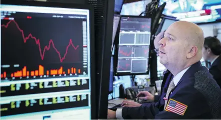  ?? DREW ANGERER/GETTY IMAGES ?? Traders work at the opening bell on the floor of the New York Stock Exchange on Friday. It’s a pastime on Wall Street these days to look at the carnage, add it all up, and announce that the market is wrong, but some question whether that’s true.