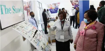  ?? ?? Informatio­n, Publicity and Broadcasti­ng Services Minister Senator Monica Mutsvangwa being shown Zimpapers publicatio­ns on display by the company’s public relations and communicat­ions manager (Digital and Publishing Division) Mrs Pauline Matanda during her tour of exhibition stands at the Zimbabwe Internatio­nal Trade Fair in Bulawayo