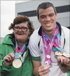  ??  ?? Thomas Connolly and Margaret Carr with their medals.