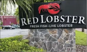  ?? THE ASSOCIATED PRESS ?? A Red Lobster restaurant in North Miami, Fla., is shown Red Lobster CEO Kim Lopdrup says the company has updated its kitchens and plans to grow its worldwide restaurant count from 750 to 1,000 in the next decade.