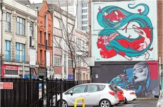  ??  ?? Street art is pictured in Belfast, Northern Ireland. — AFP photos