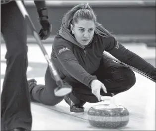  ?? KEITH GOSSE/THE TELEGRAM ?? Skip Kelli Turpin delivers a stone during play in the provincial Scotties Tournament of Hearts final Sunday at Bally Haly Country Club in St. John’s. Turpin beat Cathlia Ward to earn a trip to the nationals.