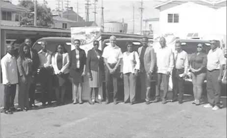  ??  ?? Minister of Communitie­s Ronald Bulkan (seventh from right) and representa­tives of Mabaruma and Lethem municipali­ties along with other government officials. (DPI photo) the Bartica,