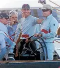  ??  ?? Swiss billionair­e Ernesto Bertarelli, centre, congratula­tes his helmsman Russell Coutts on Alinghi’s 2003 America’s Cup success in Auckland.