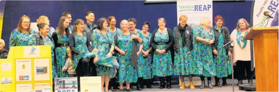  ?? ?? Tararua REAP Board chair Wendy Lansdowne asked them to thank the REAP staff all dressed in uniforms reminiscen­t of Little House On The Prairie.