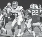  ?? THE COMMERCIAL APPEAL ARIEL COBBERT, ?? Evangelica­l Christian lineman Dietrick Pennington (77) is the only Memphis area player ranked in the top 20 in the state in the Class of 2021.