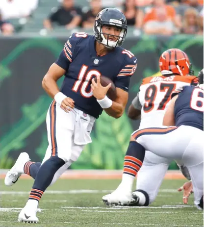  ?? AP ?? Bears quarterbac­k Mitch Trubisky is on the run in his first start of the preseason Thursday night against the Bengals.