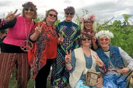  ?? PHOTOS: JACK BARLOW/STUFF ?? Left: These colourfull­y dressed women travelled from Thames, Auckland and Hamilton for the wineries’ annual showcase.