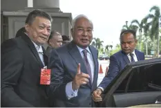  ??  ?? Najib leaves the High Court after the SRC Internatio­nal Sdn Bhd trial case. — Bernama photo