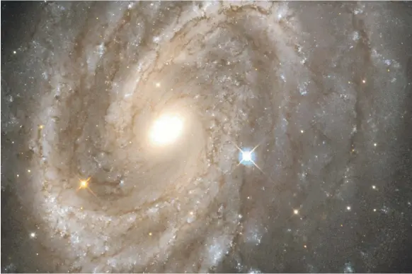  ?? Photos by Getty ?? An image of a Spiral Galaxy captured by the Hubble telescope, but is the galaxy just a tiny part of an endless loop of universes?