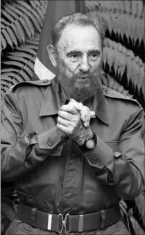  ?? CLAUDIA DAUT / REUTERS ?? President Fidel Castro of Cuba has steadfastl­y refused to issue travel documents to citizens who flee the Caribbean island.