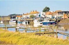  ??  ?? Country escape: the idyllic harbour at Southwold seen from Walberswic­k in Suffolk