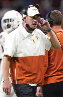  ??  ?? The Bears hired Tom Herman (left) as an offensive analyst with a focus on special projects. Mike Pettine (right) is a senior defensive assistant.