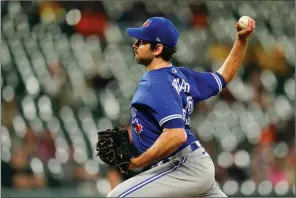  ?? ?? The Canadian Press
Toronto Blue Jays relief pitcher Jordan Romano throws a pitch to the Baltimore Orioles during the ninth inning of a baseball game on Wednesday in Baltimore.