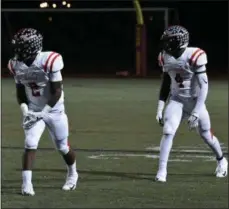  ?? MICHAEL REEVES — FOR DIGITAL FIRST MEDIA ?? Coatsville’s Dapree Bryant (2) and Aaron Young (4) get ready to run Friday night against Avon Grove.