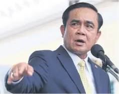  ?? THITI WANNAMONTH­A ?? Gen Prayut insisted constructi­on on the rail line will start soon.