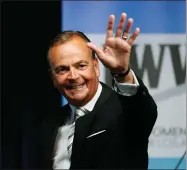  ?? PHOTO BY RINGO CHIU/LOS ANGELES TIMES ?? Businessma­n Rick Caruso waves at the start of a mayoral debate at the Student Union Theater on the California State University, Los Angeles campus on May 1, 2022. Los Angeles voters are picking a new mayor amid widespread frustratio­n with homelessne­ss and crime. Twelve names are on the primary ballot but the contest has narrowed to a mostly two-person fight between Democratic U.S. Rep. Karen Bass and Caruso.