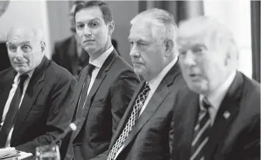  ?? Saul Loeb / AFP / Getty Images ?? Ex-Secretary of State Rex Tillerson said he asked President Donald Trump’s son-in-law, Jared Kushner, second from left, to stop making trips overseas without consulting with the State Department.