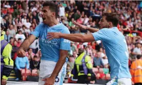  ?? Photograph: Phil Noble/Reuters ?? Rodri celebrates his dramatic winner for Manchester City with Rúben Dias.