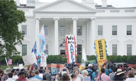  ?? — AFP ?? Immigrants and supporters rally in support of the Deferred Action for Childhood Arrivals (DACA) in front of the White House. Since taking office a year ago, Trump has pursued controvers­ial policies aimed at curbing immigratio­n into the US as part of a...