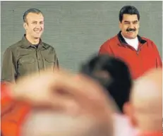  ??  ?? El vicepresid­ente, Tareck El Aissami, junto a Nicolás Maduro.