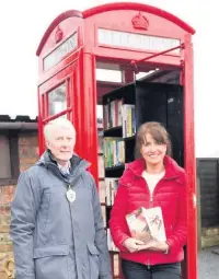  ??  ?? A phone box in Mottram was converted into a community library in April