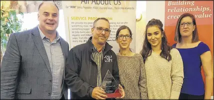  ??  ?? New Small Business of the Year – Levels Game Loft Dave Ritcey of award sponsor Community Credit Union with Derek, Christine and Paige White of Levels Game Loft in Truro and chamber president Joanne Mcrae.