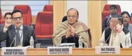  ??  ?? From left: Revenue secretary Hasmukh Adhia, finance minister Arun Jaitley, minister of state for finance Santosh Kumar Gangwar during the meeting of the GST Council in New Delhi on Monday