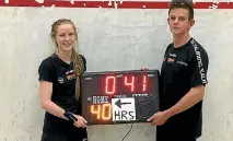  ??  ?? Palmerston North’s Kaitlyn Watts, left, and Richard Bell after completing their world record of 40 hours of squash.