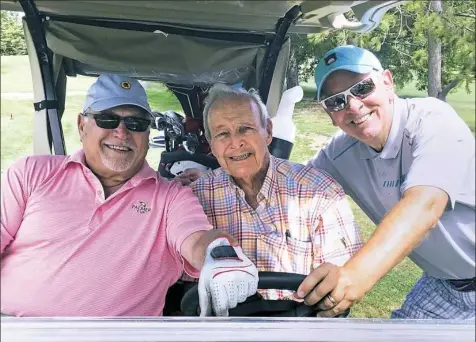  ??  ?? The Fan golf host Mike Dudurich, Arnold Palmer and Post-Gazette golf writer Gerry Dulac at Latrobe Country Club in August.