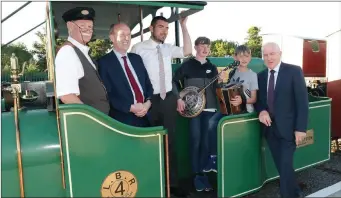  ??  ?? Transport Minister Shane Ross takes a ride on the Lartigue Monorail following the launch of the new Local Link Kerry evening community bus service.