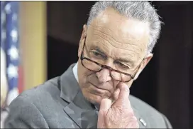  ?? J. SCOTT APPLEWHITE / AP ?? Senate Minority Leader Chuck Schumer of N.Y. praised a sweeping sanctions package to punish Russia for meddling in the presidenti­al election and for military aggression in Ukraine and Syria, calling the bipartisan bill “strong.”