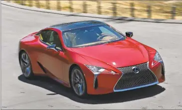  ?? Mel Melcon Los Angeles Times ?? MADE IN THE MOLD of a classic grand tourer, the Lexus LC500 offers a blend of performanc­e and luxury perfect for a high-speed coastal jaunt. The coupe will turn heads, but it isn’t quite sure what it’s aiming to be.