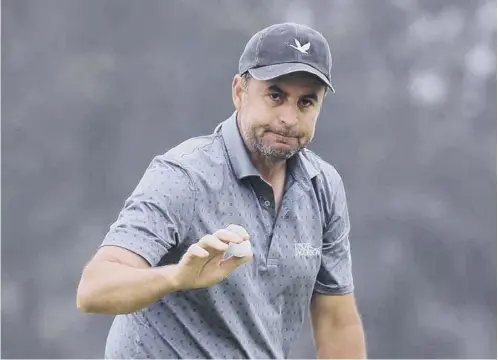  ??  ?? Richard Bland waves after making birdie on the 13th hole during the second round of the 2021 US Open at Torrey Pines