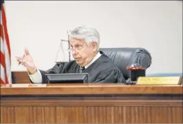  ?? Benjamin Hager Las Vegas Review-journal @benjaminhp­hoto ?? Justice of the Peace Gus Sullivan addresses the court Monday during a pretrial hearing for Marcel and Patricia Chappuis in Beatty Justice Court.