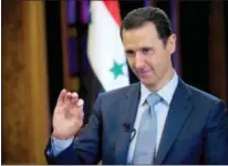  ?? SANA VIA THE ASSOCIATED PRESS ?? Syrian President Bashar Assad gestures during an interview with the BBC, in Damascus, Syria.