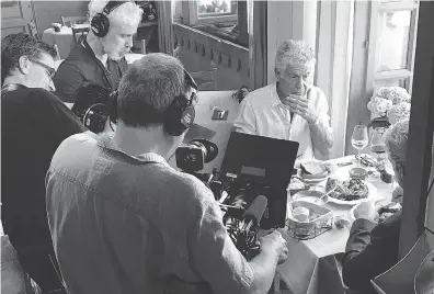  ?? ETIENNE BUTTERLIN VIA THE ASSOCIATED PRESS ?? Anthony Bourdain just days before his death with a film crew at a restaurant in France.