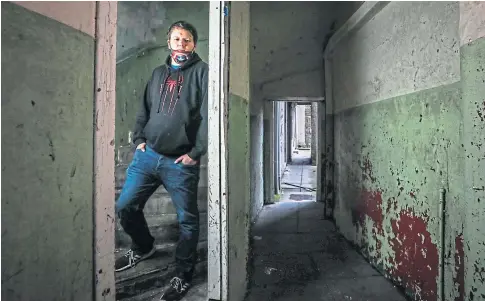  ?? Picture by Mhairi Edwards. ?? CONCERNED: Jake Osborne at his Dundonald Street tenement block, which he says is plagued by drug users.