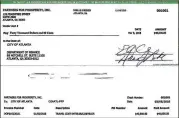  ??  ?? Partners for Progress, a nonprofit formed by Invest Atlanta to help promote affordable housing, job creation and economic developmen­t, cut this $40,000 check to the city of Atlanta in March to defray the cost of air travel for former Mayor Kasim Reed...