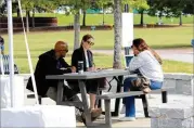  ?? COURTESY OF CITY OF SUWANEE ?? Suwanee is considerin­g ideas for permanent outdoor seating following the success of the temporary tents set up in the city’s Town Center.