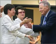  ?? Manuel Balce Ceneta / Associated Press ?? Former Sen. Birch Bayh, D-Ind., the author of Title IX in Congress, is applauded by Senior Adviser to the President and Chair of the Council on Women and Girls Valerie Jarrett, left, and tennis great Billie Jean King, in June 2012.