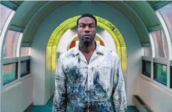 ?? PARRISH LEWIS/UNIVERSAL PICTURES AND MGM ?? Yahya Abdul-Mateen II in a scene from “Candyman,” directed by Nia DaCosta.