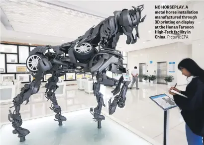  ?? Picture: EPA ?? NO HORSEPLAY. A metal horse installati­on manufactur­ed through 3D printing on display at the Hunan Farsoon High-Tech facility in China.