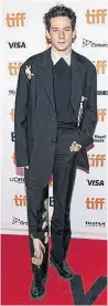  ??  ?? British actor Josh O’Connor attended the “Mothering Sunday premiere” in an Acne Studios suit, featuring a print by media artist Robbie Barrat.
