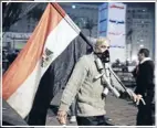  ?? Photos: Reuters, Getty Images ?? Flashpoint­s: Port Said residents react to the death sentences. Inset, a man wears empty teargas canisters and carries an Egyptian flag during the demonstrat­ion.