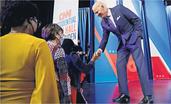  ?? ?? President Joe Biden greets attendees during a break in a CNN town hall in Baltimore, Maryland